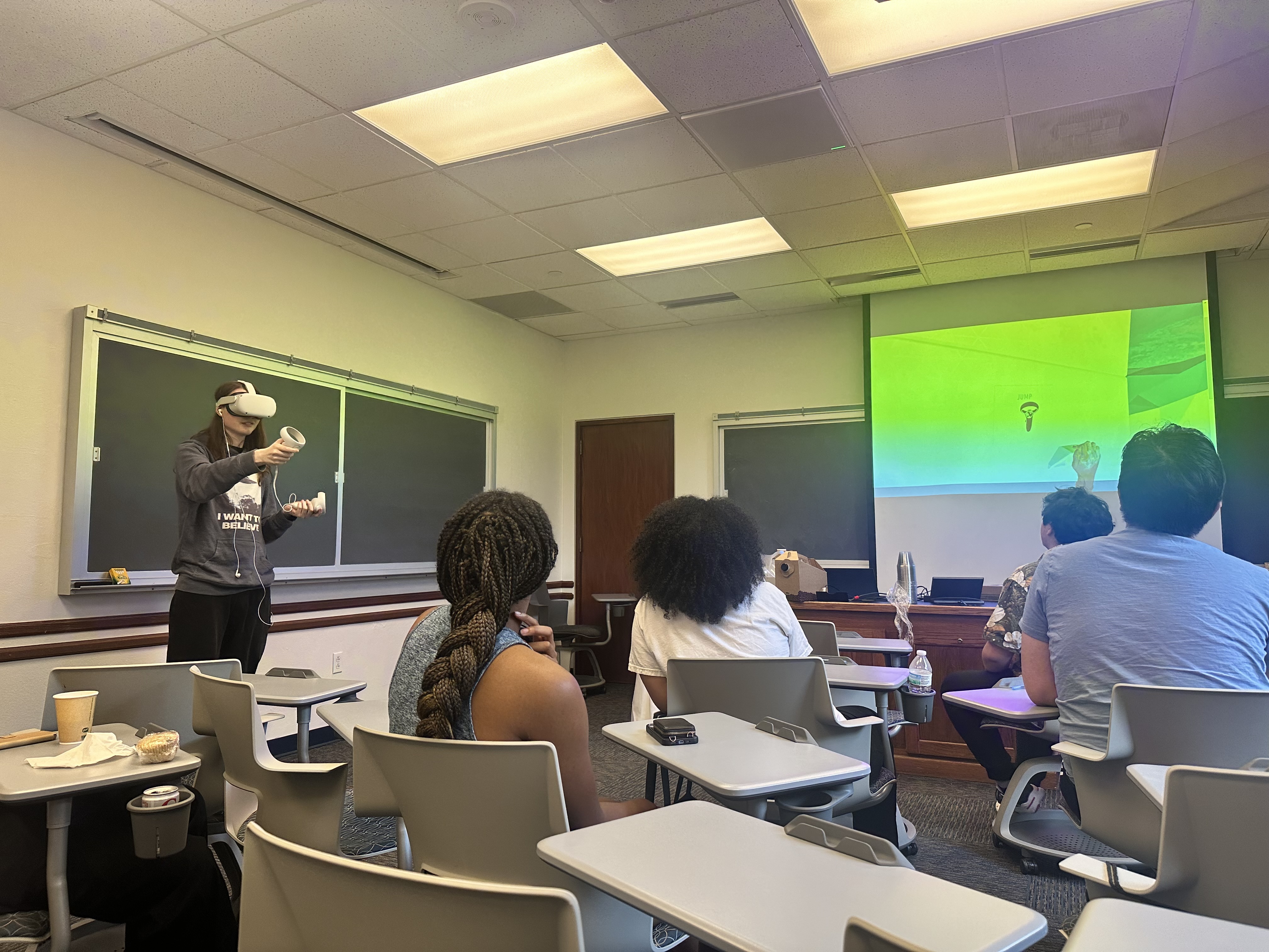 a person wearing a VR headset in a classroom